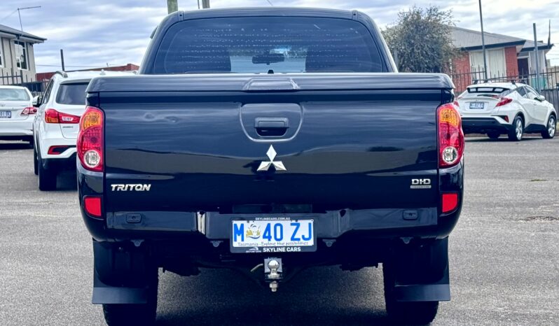 
2015 TRITON GLX (4×4) MN MY15 DIESEL TURBO DOUBLE CAB UTILITY 4CYL 2.5L full									