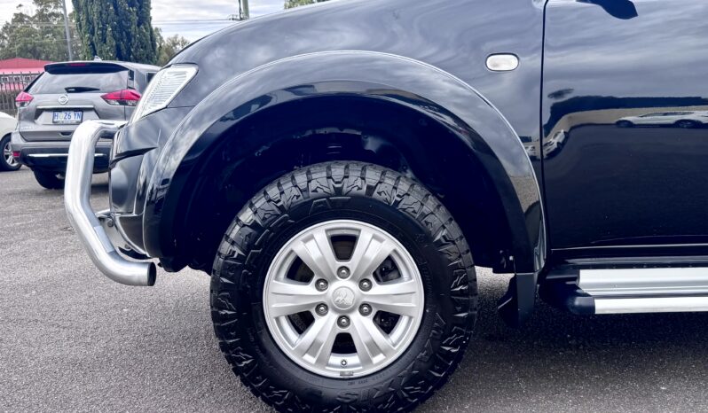 
2015 TRITON GLX (4×4) MN MY15 DIESEL TURBO DOUBLE CAB UTILITY 4CYL 2.5L full									